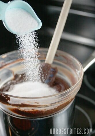 Adding sugar to melted chocolate