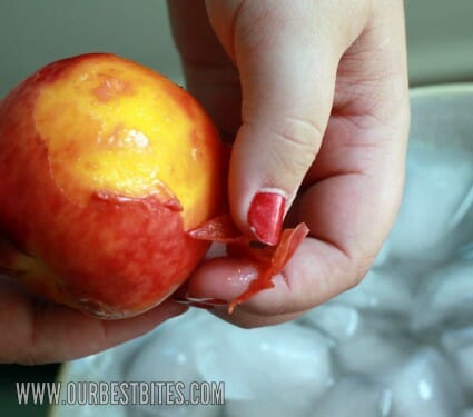 Skin peeling off peaches
