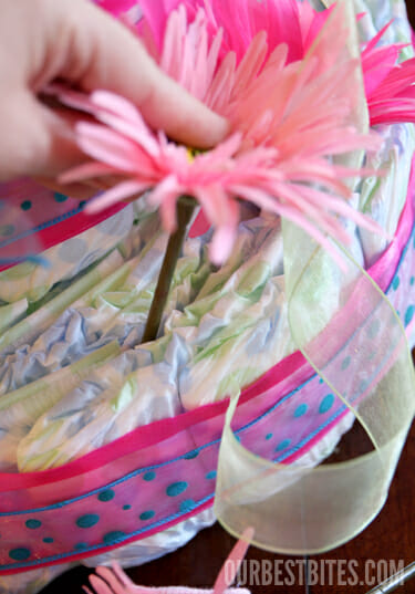 Inserting Flower in Diaper Cake