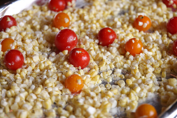 Tomato and Corn on Baking Sheet
